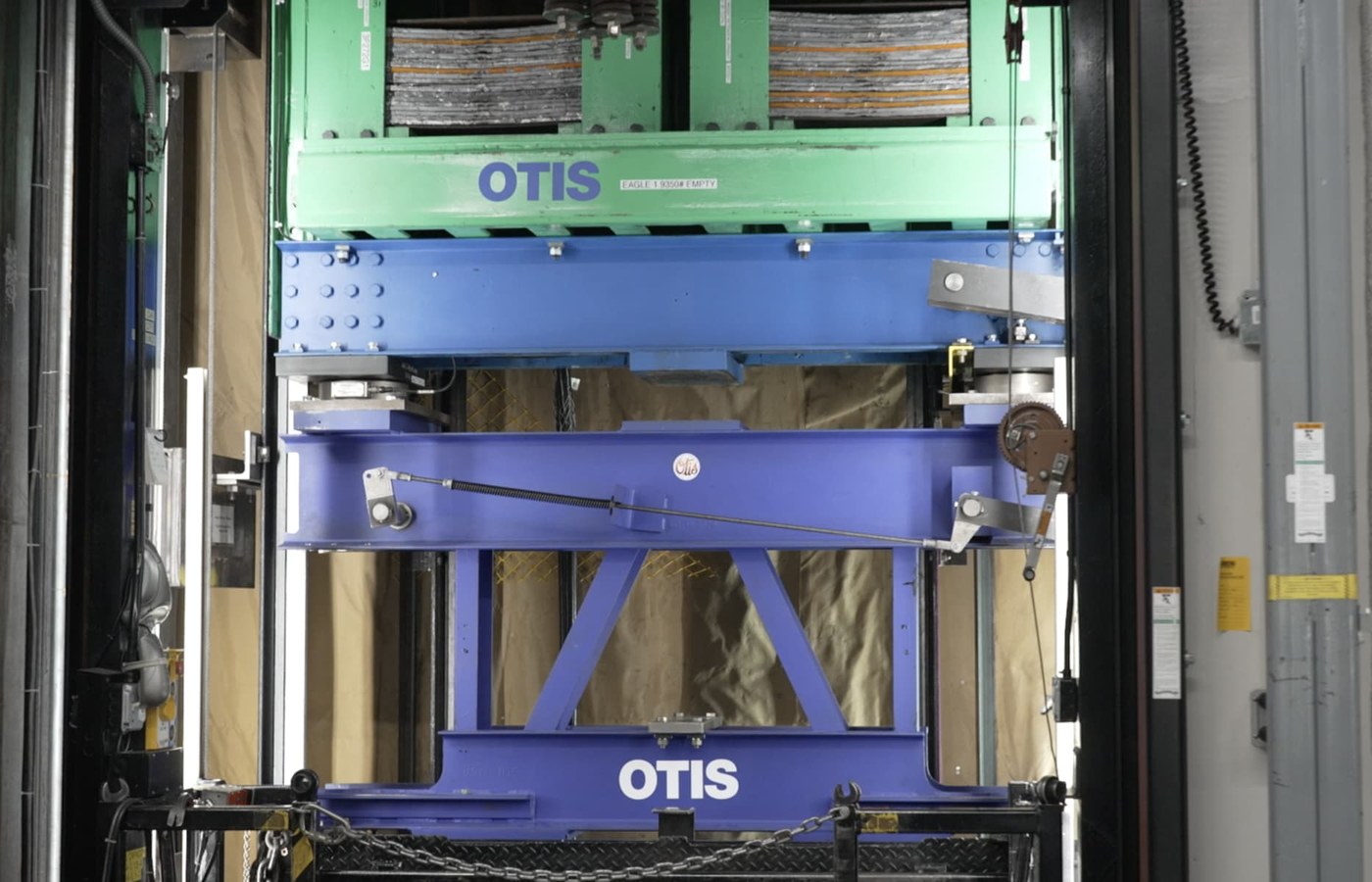 Elevator giant Otis wants to be a defensive play in an volatile market. It has to prove itself first
